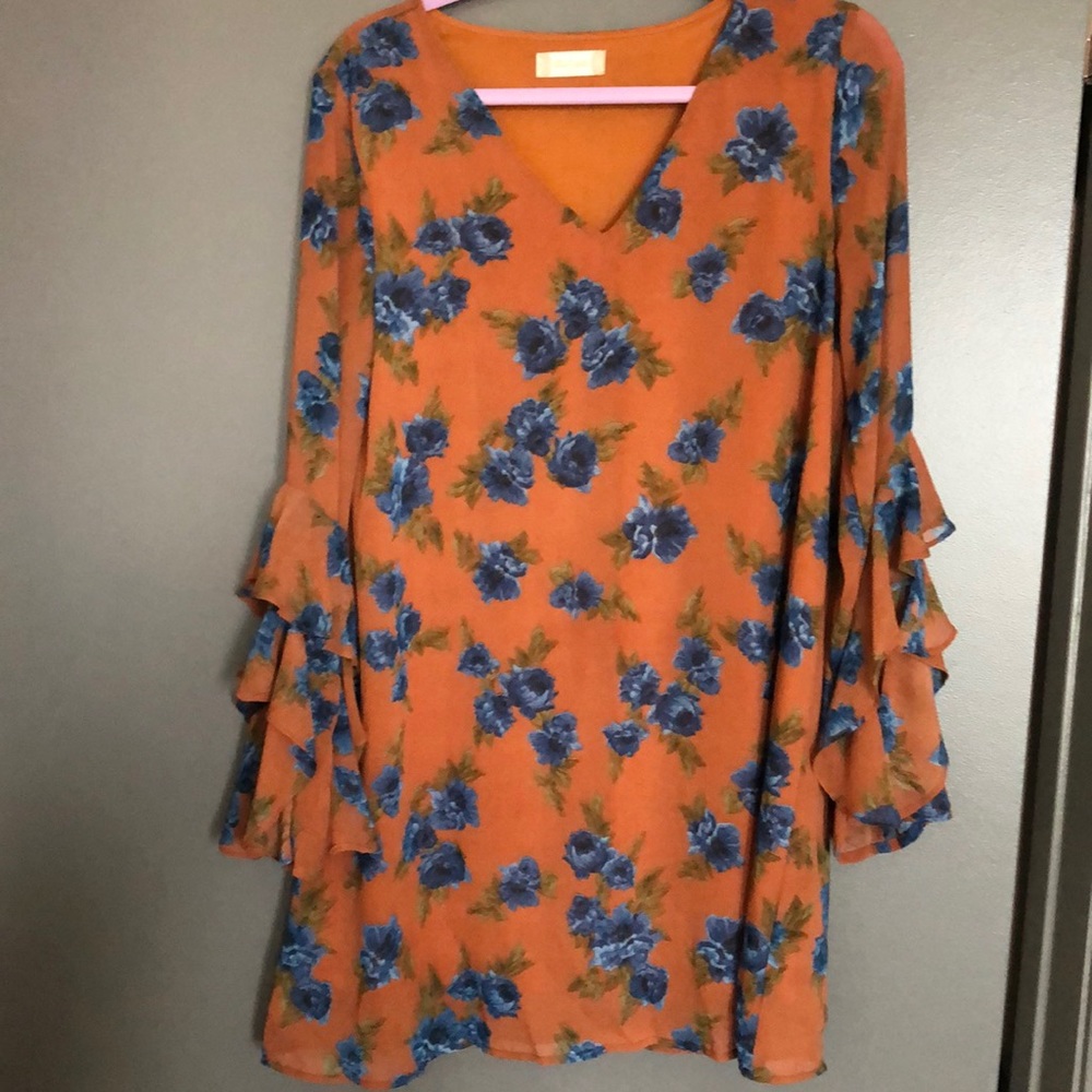 Dress size small. Altar’d State. Rust with blue flowers. A-line